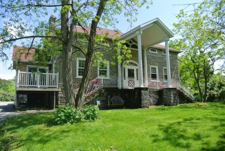 Historically designated 1830s one-and-a-half storey Ontario vernacular limestone dwelling
